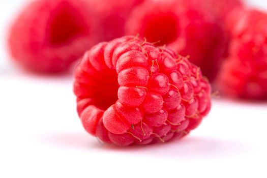 Fresh raspberry isolated on a white background