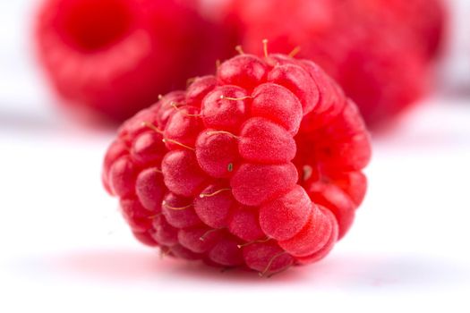 Fresh raspberry isolated on a white background