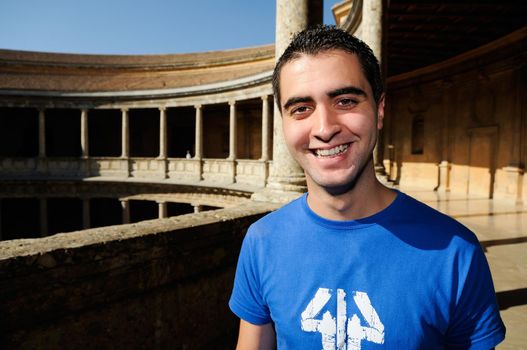 Portrait of an attractive smiling man in urban background