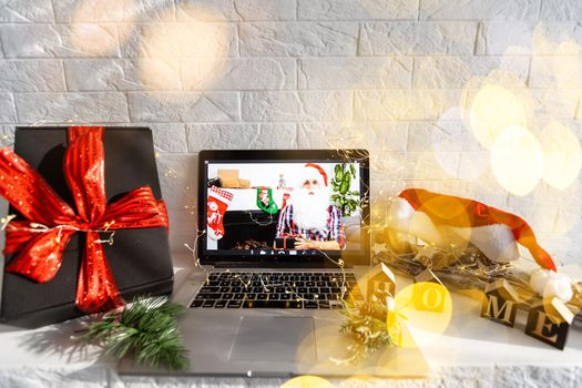 Christmas day Virtual meeting team teleworking. Family video call remote conference. Laptop webcam screen view. Diverse portrait headshots meet working from their home offices. Happy hour party online.