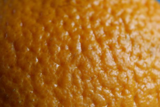 orange peel fruit close-up. Macro photo of eating orange fruit.