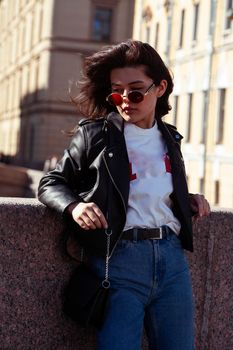 young pretty asian girl wearing sunglasses outside on big city street, lifestyle people concept close up