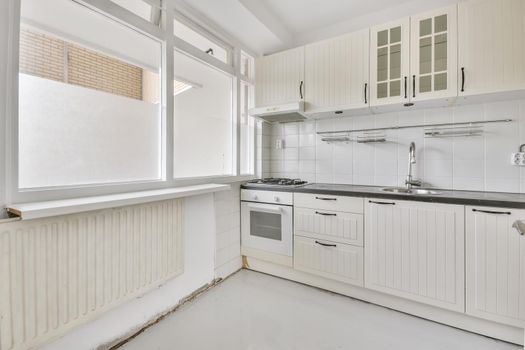 Bright kitchen with a luxury kitchen island in the elegant house