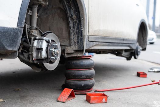 car brake part at garage,car brake disc without wheels closeup