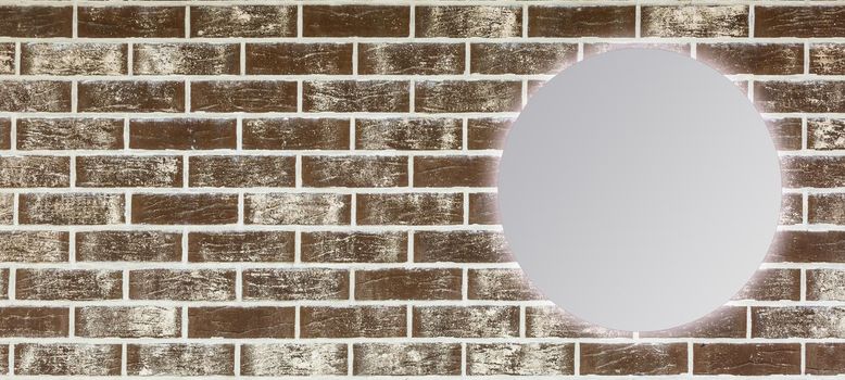 Round mirror near brick wall