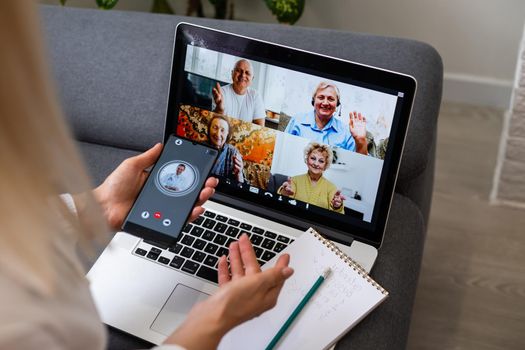 Beautiful young woman having video conference call via computer. Call Meeting. Home office. Stay at home and work from home concept during Coronavirus pandemic