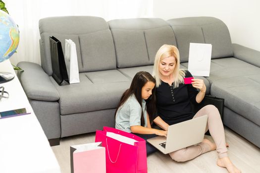 Mother and daughter shopping on internet