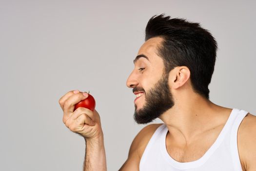 bearded man fresh tomatoes healthy lifestyle diet food studio lifestyle. High quality photo