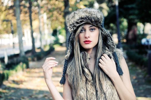 Portrait of beautiful girl with the winter hat on