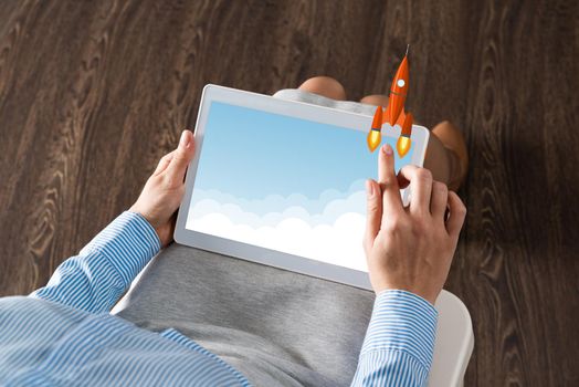 close-up of female hands with a computer tablet. Concept business startup