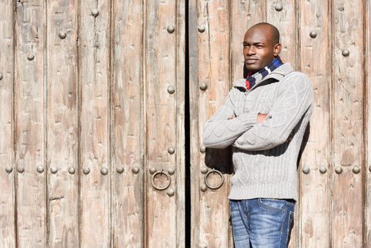 Portrait of black man wearing casual clothes in urban background