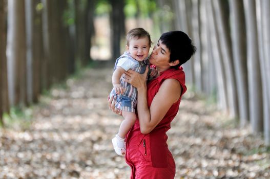 Mother and daughter in the forest