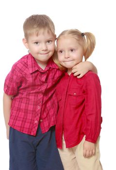 Little brother and sister cute hug.Isolated on white background.