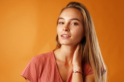 Portrait of a young beautiful happy caucasian woman smiling