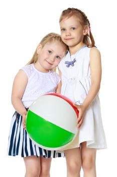 Two little girls are playing with a ball. Game concept, rest on the sea.Isolated on white background.