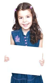 Girl in jeans dress holding a banner in front.Isolated on white background portrait.