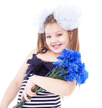 Cute little girl on the meadow in summer day