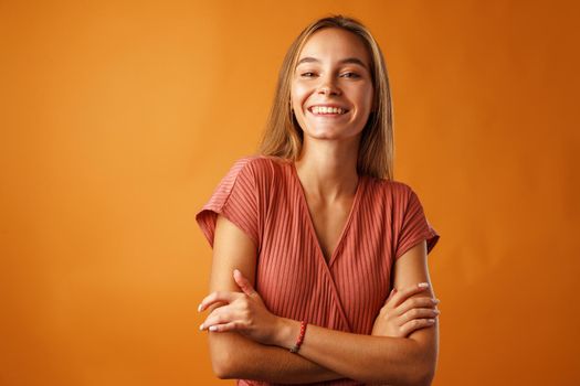 Portrait of a young beautiful happy caucasian woman smiling