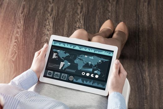 close-up business woman with computer tablet on lap