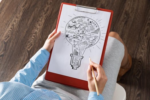 close-up, woman draws business notes in her notebook. Business Innovation Concept