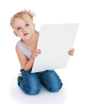 Little girl with a big piece of paper. Isolated on white background .