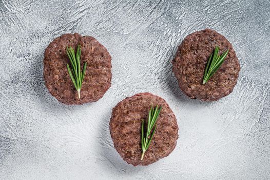 Grilled hamburger meat cutlets patties. White background. Top view.