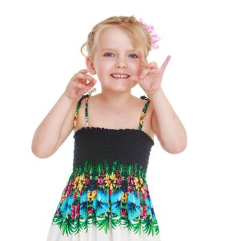 Cheerful little girl gesturing with his hands. Isolated on white background .