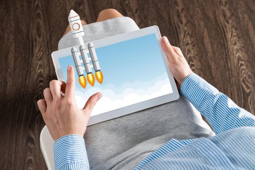 close-up of female hands with a computer tablet. Concept business startup