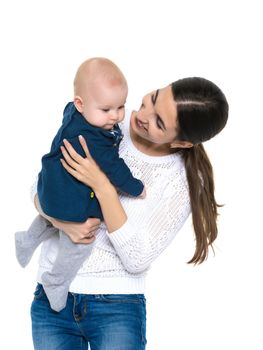 Young mother and little daughter gently embrace. The concept of Happy Childhood, Family Happiness, Raising a Child. Isolated on white background.