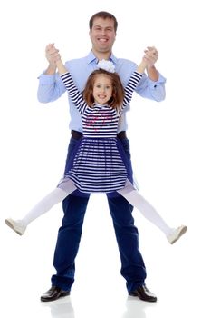 Happy young dad raise his beloved daughter's hands.Isolated on white background.