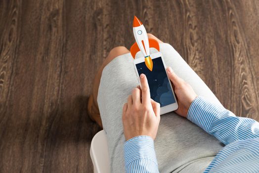 close-up of female hands with a smartphone. Concept business startup