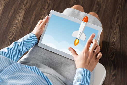 close-up of female hands with a computer tablet. Concept business startup