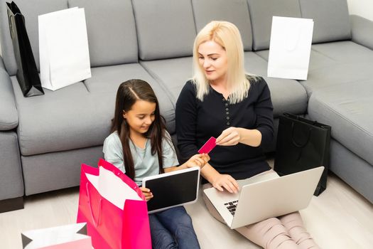 Mother and daughter shopping on internet