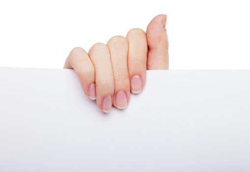 Advertising: Hand holding white empty paper. Isolated over white background.