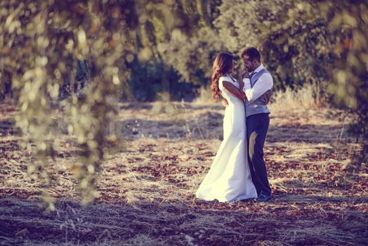 Just married couple together in nature background