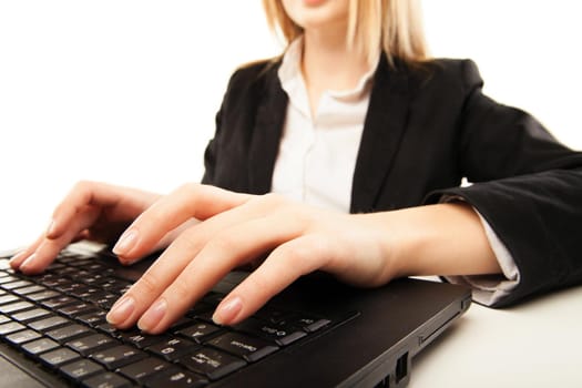 Woman hands typing on laptot, close-up, isolated over white background