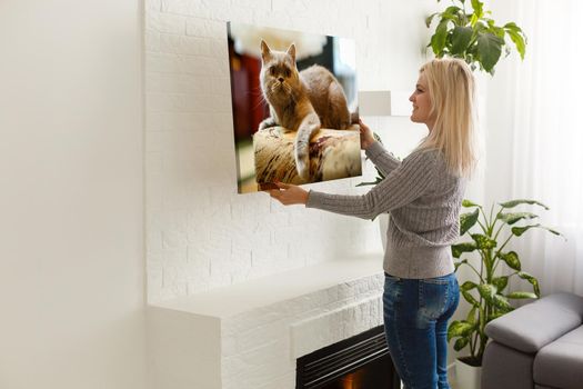 Woman holding wedding photography photo canvas print with gallery wrap