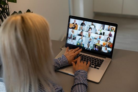 Beautiful young woman having video conference call via computer. Call Meeting. Home office. Stay at home and work from home concept during Coronavirus pandemic