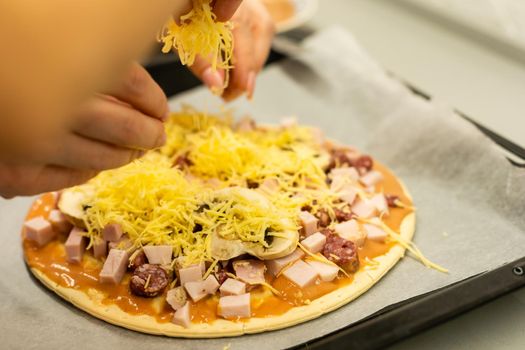 child cook homemade pizza, little girl makes pizza at home