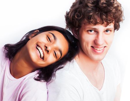 best friends teenage girl and boy together having fun, posing emotional on white background, couple happy smiling, lifestyle people concept, blond and brunette multi nations close up