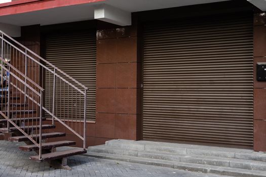 Window with modern shutter, exterior shot.