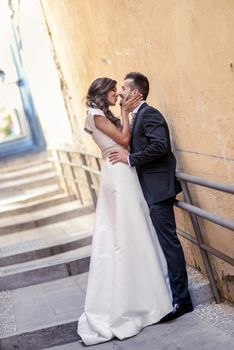 Just married couple together in urban background