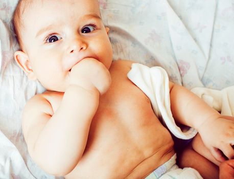 little cute baby toddler on carpet closeup smiling, adorable kid