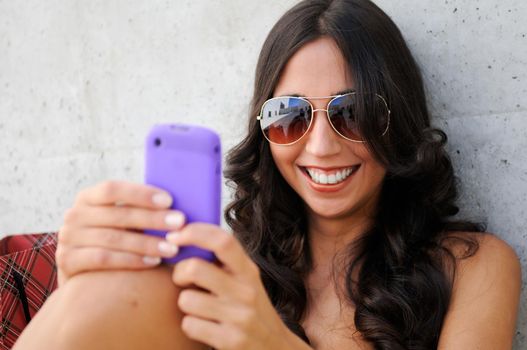 Young beautiful woman talking on phone