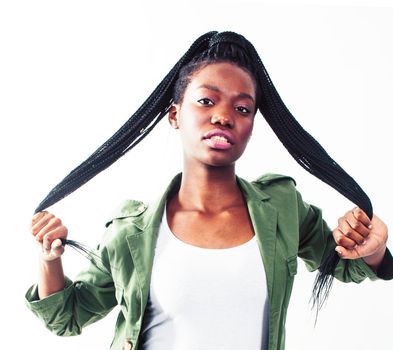 young pretty african-american girl posing cheerful emotional on white background isolated, lifestyle people concept close up