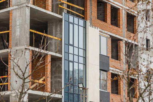 scaffolding on a building wall. building getting a new paint.