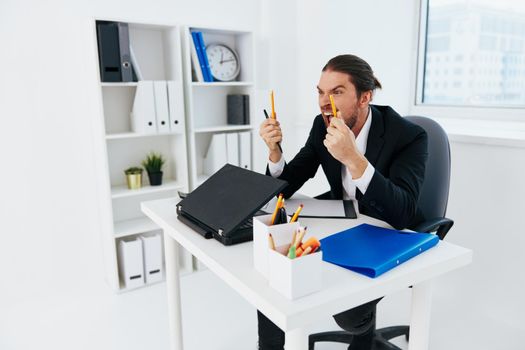 businessmen emotions work office desk boss. High quality photo