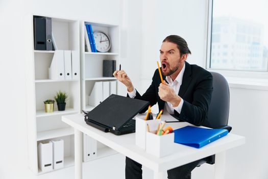 businessmen emotions work office desk boss. High quality photo