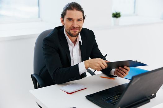 Man emotions work office desk technology. High quality photo