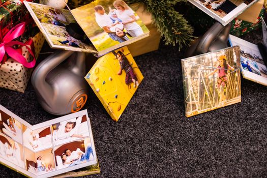 Heavy dumbbells weight and Christmas tree. photo canvas near the christmas tree